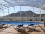 Domed screened pool enclosure